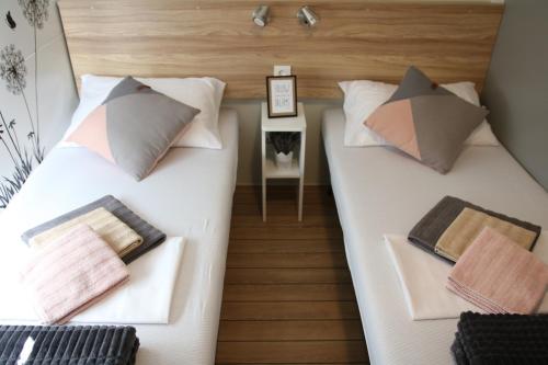 Postel nebo postele na pokoji v ubytování Mobile home Laurus