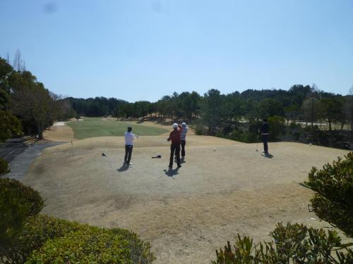 a group of people playing golf on a golf course at Wakihonjin in Kikugawa