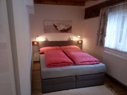 Кровать или кровати в номере Ferienhaus Bauer