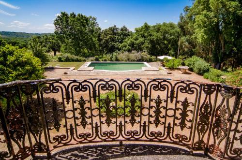 a view from the balcony of a house with a pool at Quinta do Tojal in Ferreira do Zêzere
