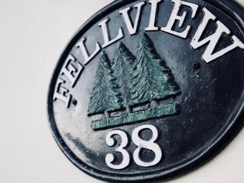 a dollar coin with trees on it at Fellview Guest House in Bowness-on-Windermere
