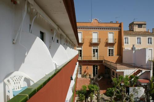 a view from the balcony of a building at Hostal Plaja i Pati de Can Plaja in Palafrugell