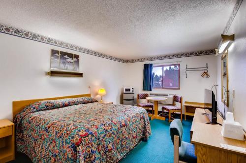 Postel nebo postele na pokoji v ubytování Motel 9