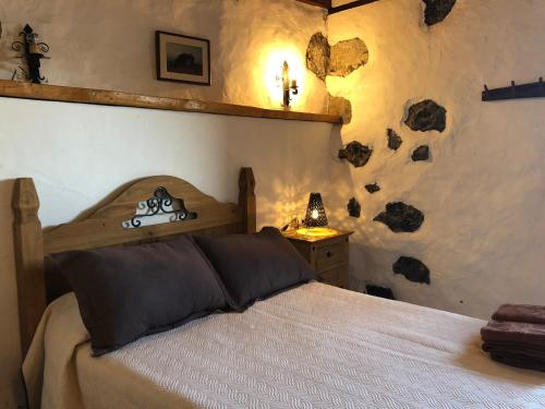 Llit o llits en una habitació de Casa Rural La Pagarrona