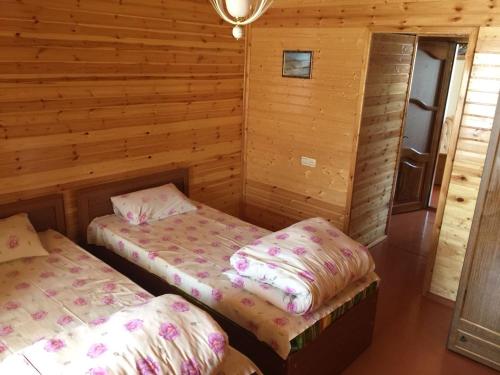 Кровать или кровати в номере Lahic Hostel