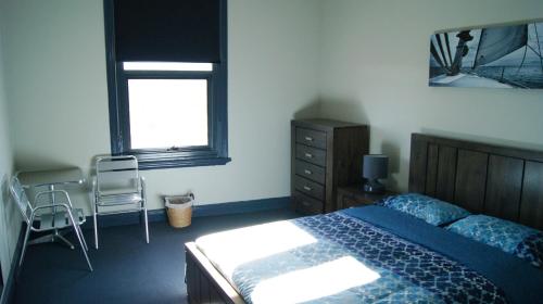 Letto o letti in una camera di Australia Hotel Fremantle