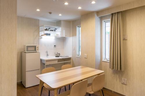 Kuchyň nebo kuchyňský kout v ubytování Hotel SAILS