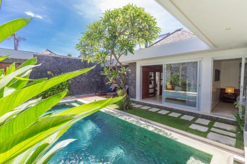 a swimming pool in the backyard of a villa at Vishuddha Ajna Villa - Outstanding 2 bdr villa - GREAT LOCATION! in Seminyak