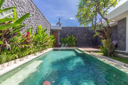 a swimming pool in the backyard of a villa at Vishuddha Ajna Villa - Outstanding 2 bdr villa - GREAT LOCATION! in Seminyak