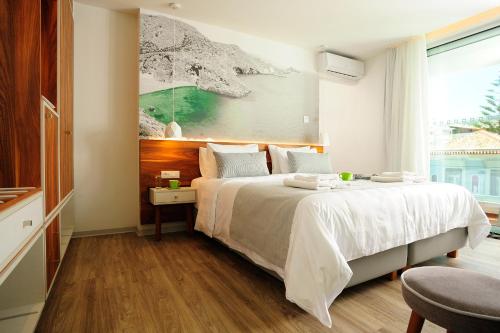 Ένα ή περισσότερα κρεβάτια σε δωμάτιο στο Atrium Ambiance Hotel