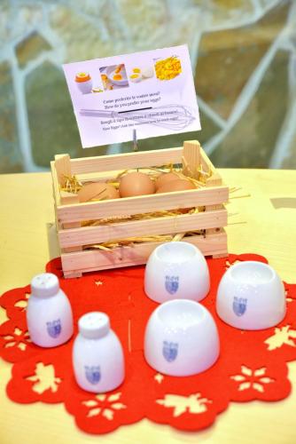 a box of eggs sitting on a table at Hotel d'Altavilla in Canosa di Puglia