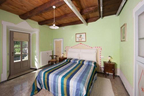 Postel nebo postele na pokoji v ubytování B&B I Corni di Nibbio