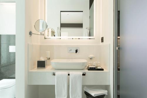 Et badeværelse på Corso 281 Luxury Suites