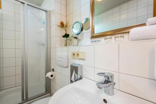 Koupelna v ubytování Hotel Ambassador-Berlin Grünau