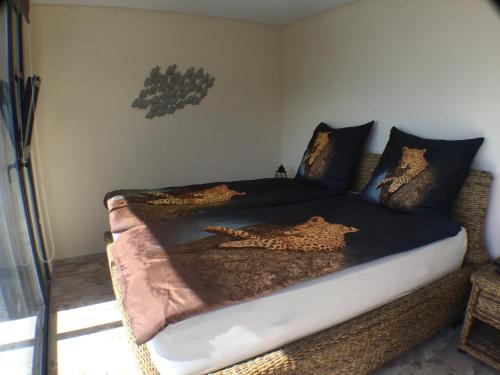 Ένα ή περισσότερα κρεβάτια σε δωμάτιο στο Guesthouse-TheView