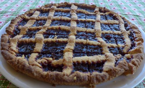 a blueberry pie on a plate on a table at Capalbio Campeggio Rurale in Capalbio