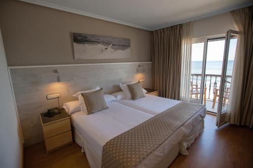 Кровать или кровати в номере Hotel Don Pepe