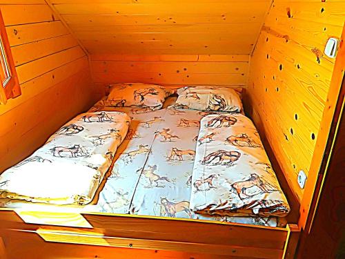Gerenda Nyaralóにあるベッド
