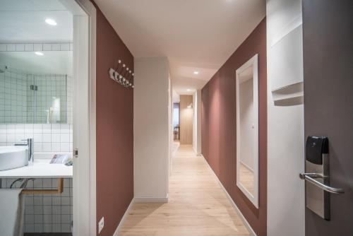  Hotel & Aparthotel Cosmos -  Room  picture :   Tea/Coffee maker    Shower    Safety deposit box                           