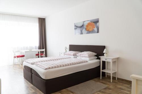 Llit o llits en una habitació de Gasthof zur Post