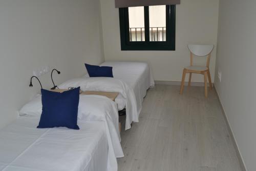 Posteľ alebo postele v izbe v ubytovaní Apartamento Trempat