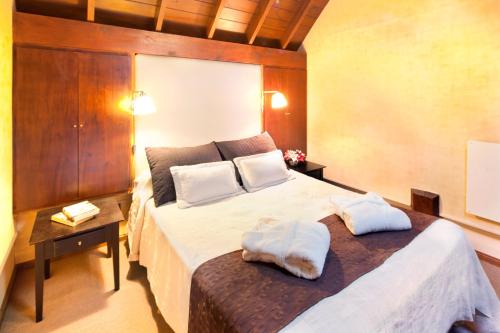 Кровать или кровати в номере La Mansion del Bosque