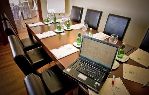 a laptop computer sitting on top of a table at Sea View Resorts & Spa in Karfas