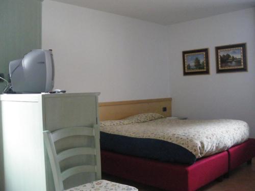 Кровать или кровати в номере Agriturismo Raethia