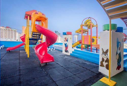 a playground with a slide at Magic Cristal Park in Benidorm