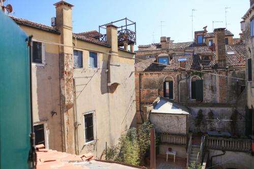 an overhead view of an alley with buildings at Hotel Bridge in Venice