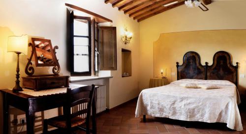 Postel nebo postele na pokoji v ubytování B&B Antiche Rime