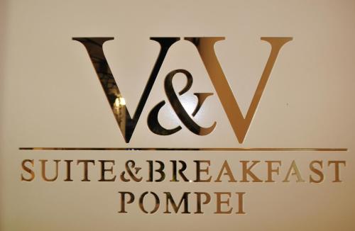a sign that reads vwx sufflicted andbreakfast corner at V&V Suite & Breakfast in Pompei