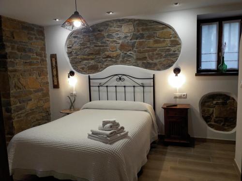 A bed or beds in a room at La Corrala de Jose Susana