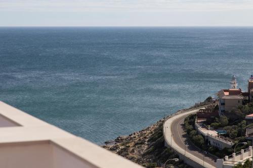 a view of the ocean from a balcony at Lighthouse Cullera Penthouse in Cullera