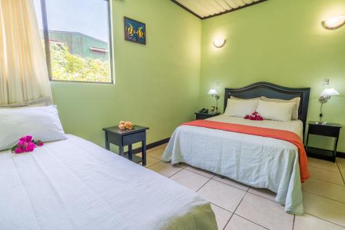 Postel nebo postele na pokoji v ubytování Kayak Lodge