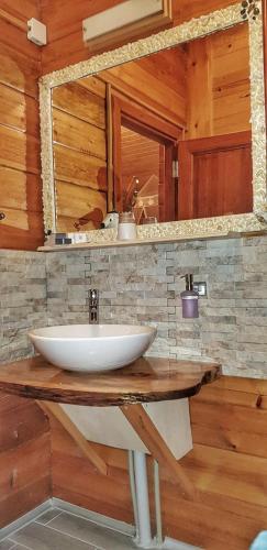 a bathroom with a white sink and a mirror at Portalimo Lodge Hotel - Adult Only +12 in Cıralı