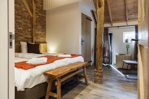 מיטה או מיטות בחדר ב-Bed & Breakfast De Schoppe