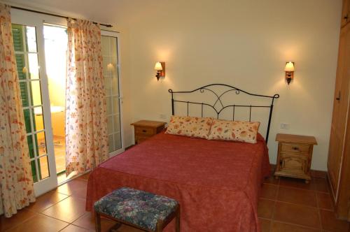 Ένα ή περισσότερα κρεβάτια σε δωμάτιο στο Hotel El Sombrerito
