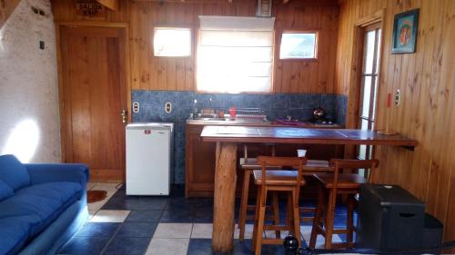 Kuchyň nebo kuchyňský kout v ubytování Algarrobo Suites