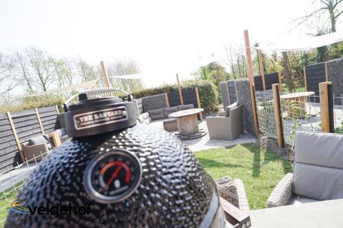 a bottle with a camera on top of it at 't Veldehof in Domburg