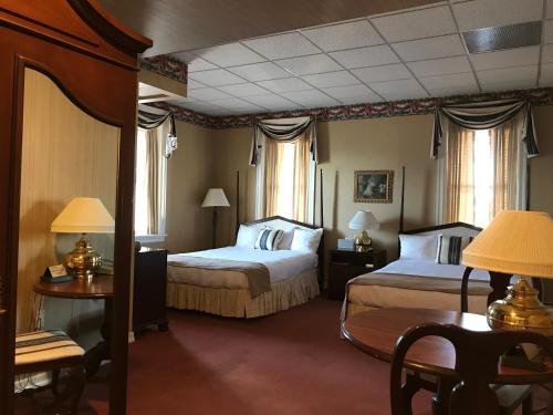 Postel nebo postele na pokoji v ubytování Waynebrook Inn