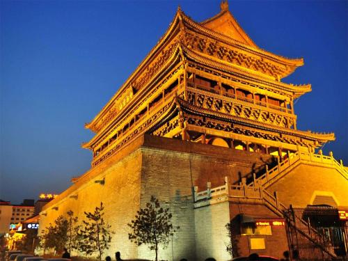 an image of the eiffel tower at night at Grand Hyatt Xi'an in Xi'an