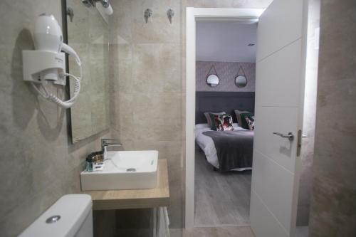 Kúpeľňa v ubytovaní Apartamentos Soho Boutique Museo