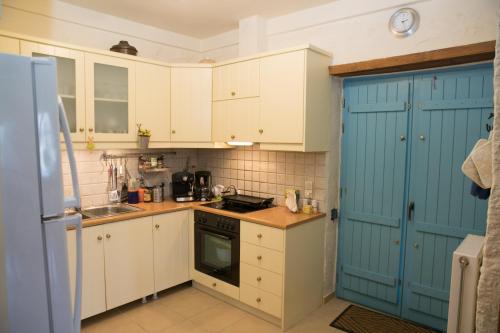 Una cocina o zona de cocina en Villa Smaragda