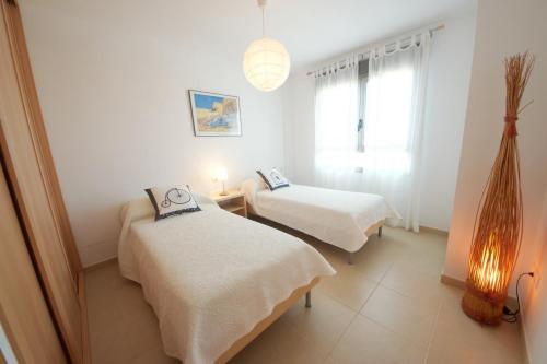 Ένα ή περισσότερα κρεβάτια σε δωμάτιο στο Casa Joana
