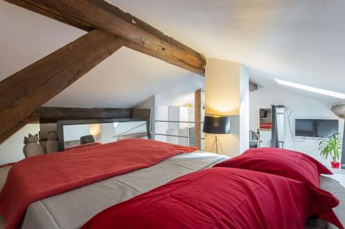 Ένα ή περισσότερα κρεβάτια σε δωμάτιο στο Lyon