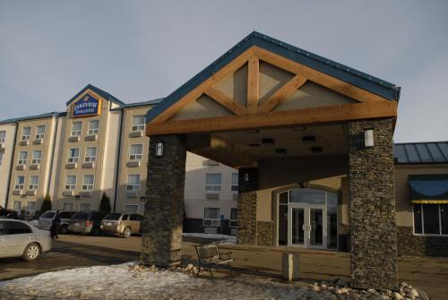 a building with awning in front of a building at Lakeview Inns & Suites - Fort Saskatchewan in Fort Saskatchewan
