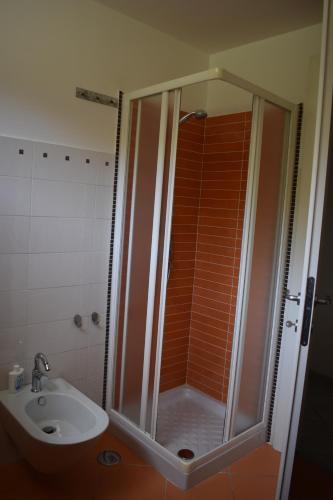 a bathroom with a shower and a sink at Sofia Mare in San Felice Circeo