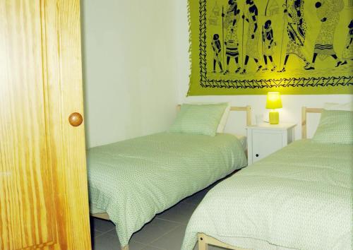 Ένα ή περισσότερα κρεβάτια σε δωμάτιο στο Feriado Apartment