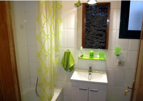 Ένα μπάνιο στο Feriado Apartment